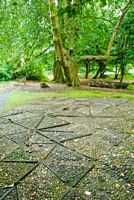 A newly discovered section of tiled flooring in the garden