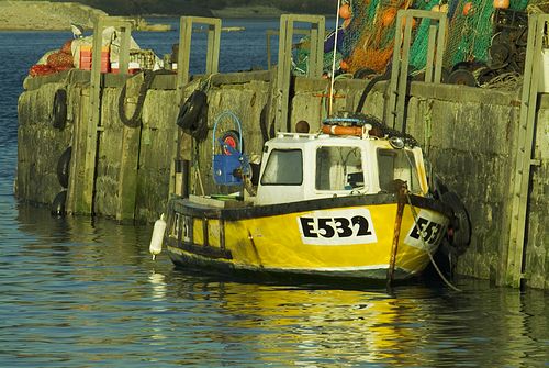 Boat tied up at The Cobb, Lyme Regis