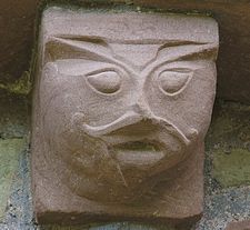 Carved figure, Kilpeck church