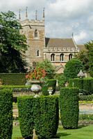 The formal gardens and Belton church