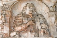 Alabaster memorial to Brian Cooke in the chancel