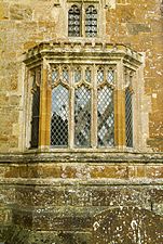 Aisle window, Frieze carvings, St Mary's Adderbury