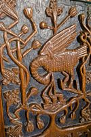Carved and painted bench end