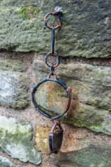 Shackles hung on the tower wall