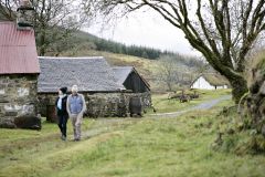 Visitors explore the village
