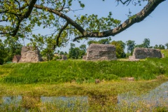 The curtain wall across the moat