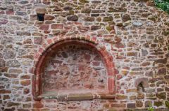 Medieval arch and piscina