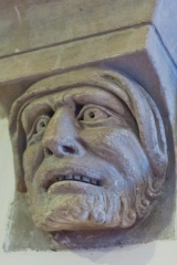 Carved corbel head