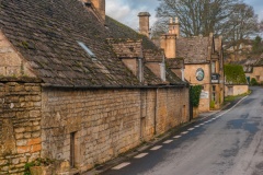 Cotswold stone cottages near the church