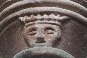Carved face, nave pillar