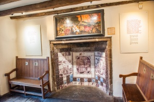 Fireplace and painted panel, first floor