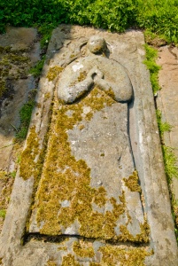 Carved grave slab of a priest