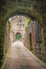 Through the barbican to the 12th century gatehouse