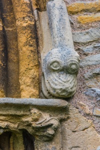 Dragon's head carving, west doorway arch
