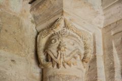 Carved head, south doorway