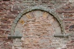 The blocked Norman doorway arch