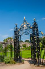 The ornate wrought-iron garden gates