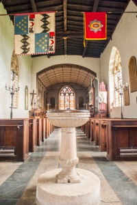 The 18th century font and nave