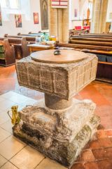 The 12th-century font in St Mary's Church