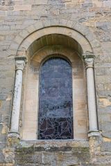 The Romanesque west tower window