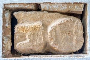 Sheila-na-gig carving in the chancel wall