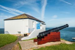 The Old Coastguard House and cannon