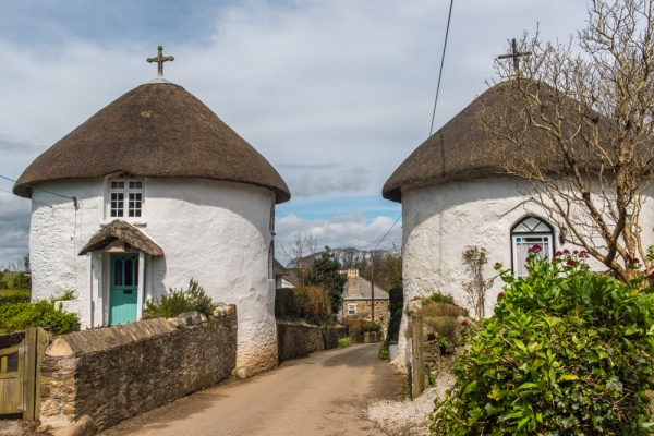 A pair of the famous Veryan thatched roundhouses