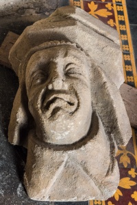 Carved head in the chancel