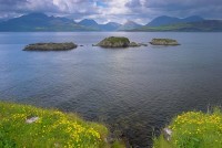Photo of the Cuillin Hills from the ramparts of Dunscaith Castle on the Isle of Skye, Scotland. Part of the Britain Express Travel and Heritage Picture Library, Scotland collection.
