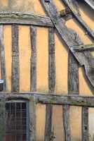 Detail of cruck framing with supporting half-timbering