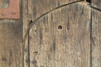 The west door is riddled with musket holes left when Lancastrian soldiers fleeing the Battle of Tewkesbury were pursued and killed here by their Yorkist foes