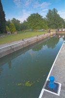  A popular riverside pub stands just beyond the lock