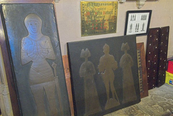 Funerary brasses in the Trinity Chapel. The brasses were gathered here by Giles Gilbert Scott during a Victorian restoration of the church. Photo of the Church of St John Baptist, Cirencester, Gloucestershire.
