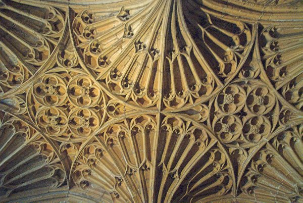 Medieval vaulting on the ceiling of the south porch. The porch is exceptionally large and beautifully decorated, even by the standards of Cotswold wool churches. Photo of the Church of St John Baptist, Cirencester, Gloucestershire.
