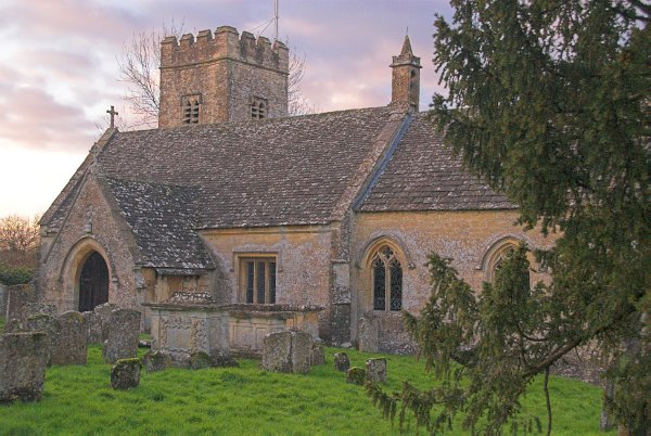 The view of St Peter's from the south. Photo of St Peter's Church, Little Barrington, in the Gloucestershire Cotswolds. Part of the Britain Express travel and heritage picture library.