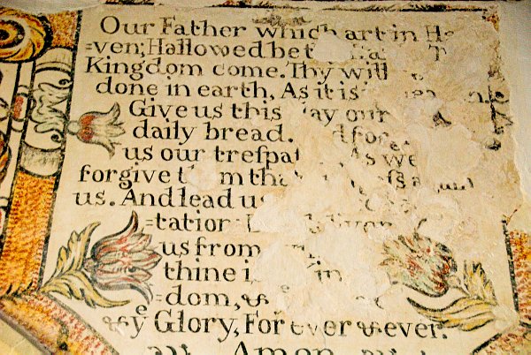 Wall painting illustrating the Lord's Prayer, dated to 1736. Photo of St Peter's Church, Little Barrington, in the Gloucestershire Cotswolds. Part of the Britain Express travel and heritage picture library.