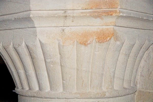 Scalloped column capitals in the nave. Photo of St Peter's Church, Little Barrington, Gloucestershire. Part of the Britain Express historic picture library.