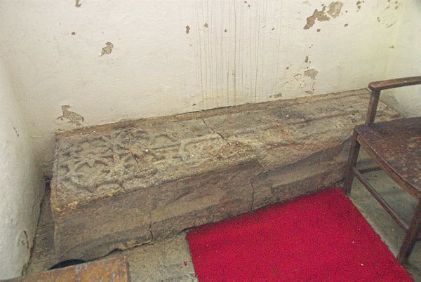 In the tower is this early foliated gravestone, which is probably no later than 1300. Photo of All Saints Church, Salperton, Gloucestershire. Part of the Britain Express Historic Picture Library.