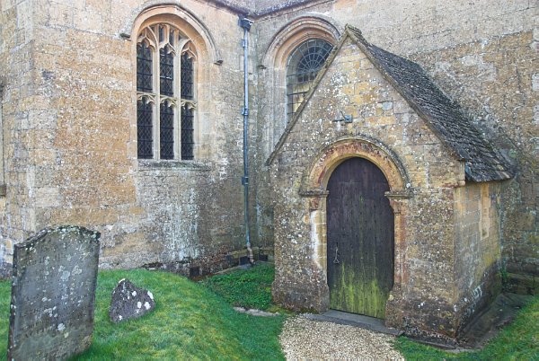 The porch and transept. Here you see predominantly 15th century architecture, which is decidedly at odds with the remodelled nave. Photo of St Mary's Church, Temple Guiting, Gloucestershire. Part of the Britain Express Historic Picture Library.