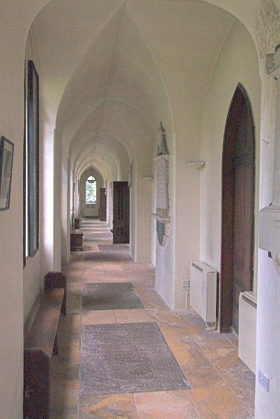 The north ambulatory. Rather than traditional aisles, St Mary's has north and south ambulatories which are separated from the nave by dividing walls. Photo of St Mary's Church, Tetbury, in the Gloucestershire Cotswolds. Part of the Britain Express Travel and Heritage Picture Library.
