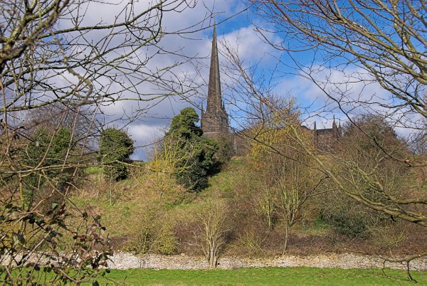 The view of Tetbury from the south. The mound in the right of the photo is a suspected Iron Age hill fort, while the church is built on the presumed site of a 7th century Saxon monastery.