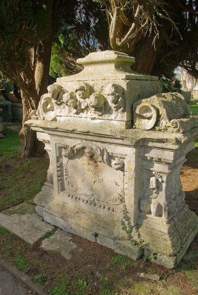 This fanciful tomb stands outside the northeast corner of the church. Photo of St Mary's Church, Tetbury, in the Gloucestershire Cotswolds. Part of the Britain Express Travel and Heritage Picture Library.