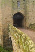 The gatehouse and barbican leading across a deep moat