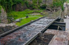 The trough feeding the water wheel