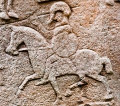 Churchyard cross slab, battle detail of horseman