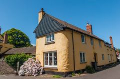 An attractive cottage opposite the bridge