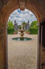 A garden arch and fountain