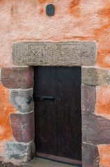 The doocot entrance and Hepburn coat of arms
