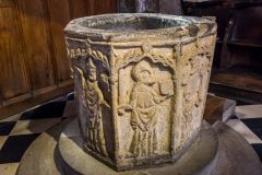 The beautifully carved 14th century font