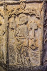 Carved panel on the font